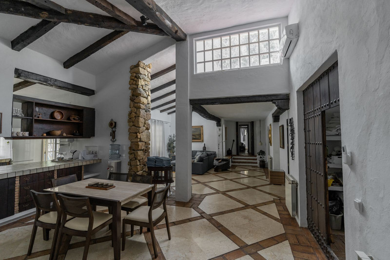 Dining area with beamed ceiling